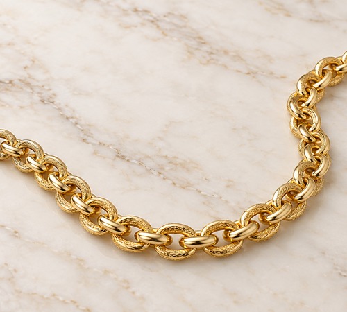 Ketting en armband met Amerikaanse schakels, met reliëf