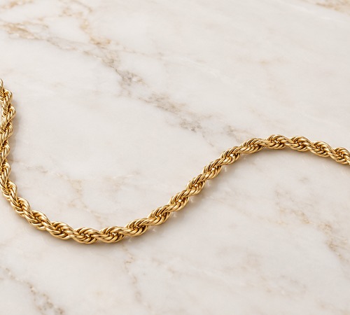 Ketting met gedraaide koordachtige schakels, met gevlochten effect